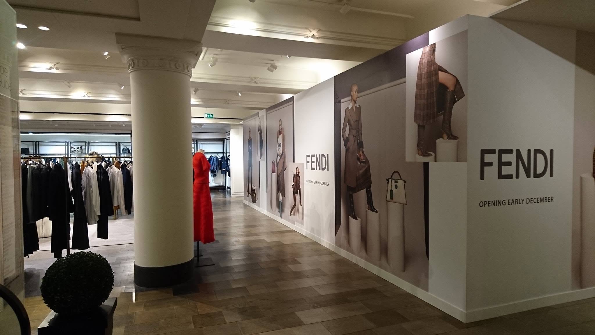 Fendi branded retail hoarding wrapping around the new store area