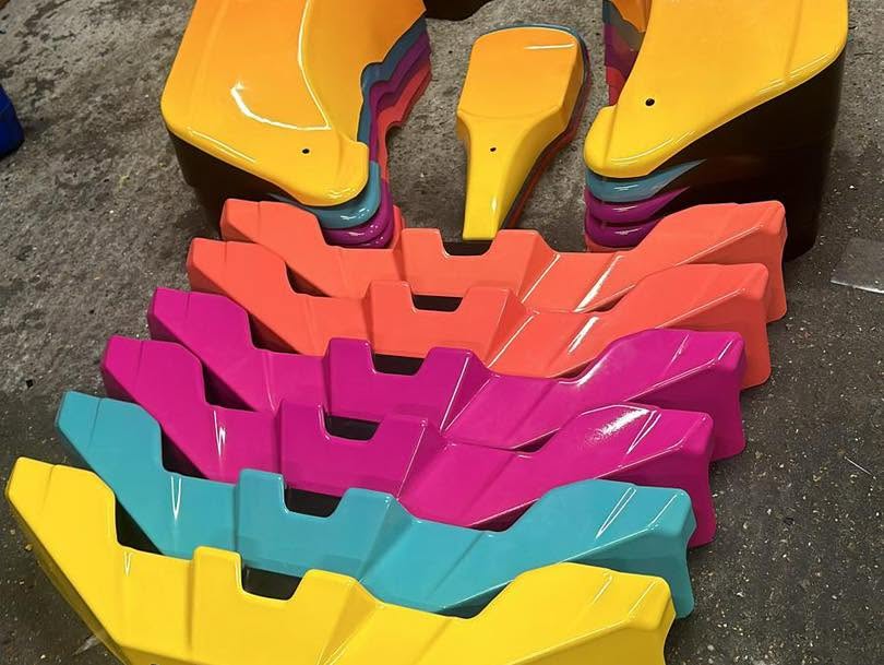 Go-kart panels wrapped in several vibrant colours